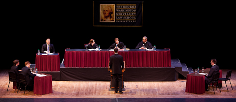 student at podium at moot court with Justice Kagan, Judge Harris Hartz, Judge Barbara Pariente at bench