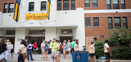 students gathered outside of GW residence hall, Thurston Hall, during move in