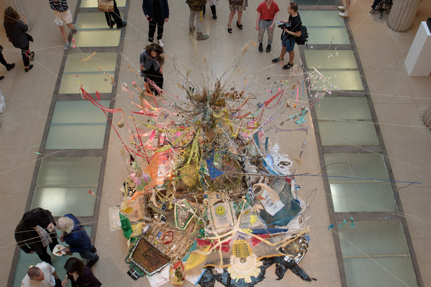 Visitors gather around an installation at NEXT's opening reception. (Sydney Elle Gray/GW Today)