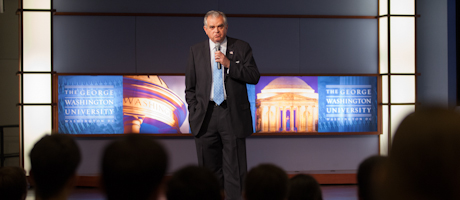 Ray LaHood speaks into microphone on stage