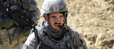 Raymond Gobberg in military attire with helmet on 