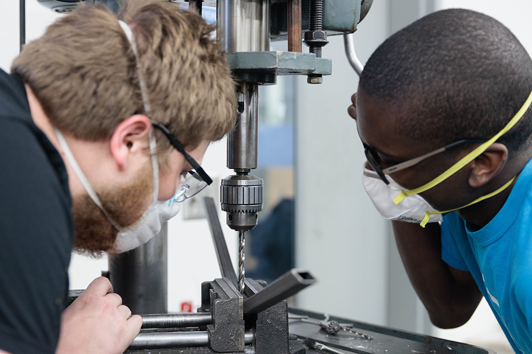 students in the machine shop