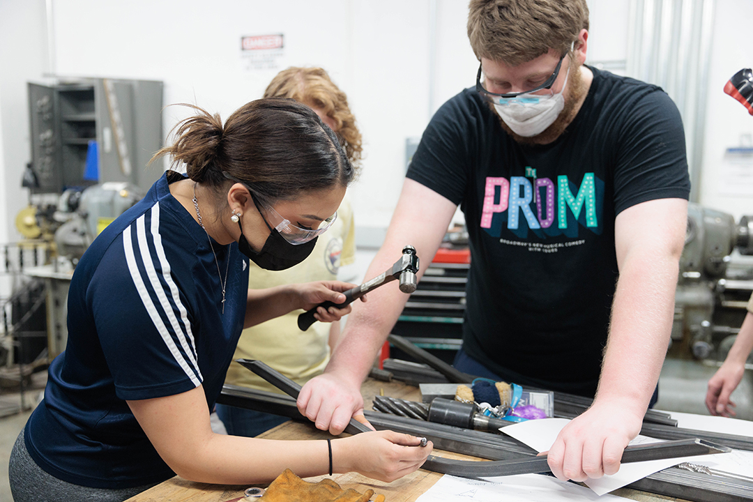 students in the machine shop