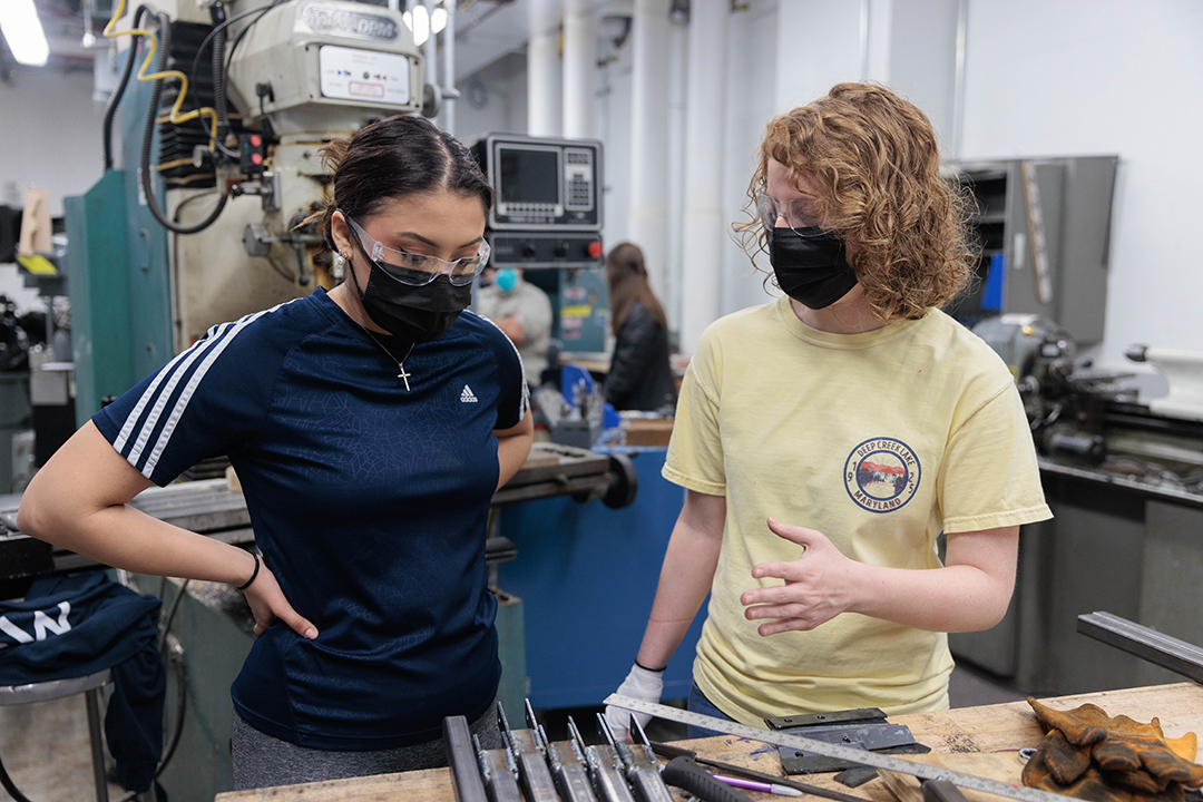 student in the machine shop