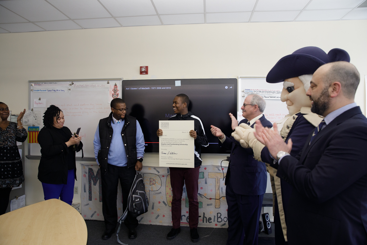 SJT winner smiles as he is awarded scholarship