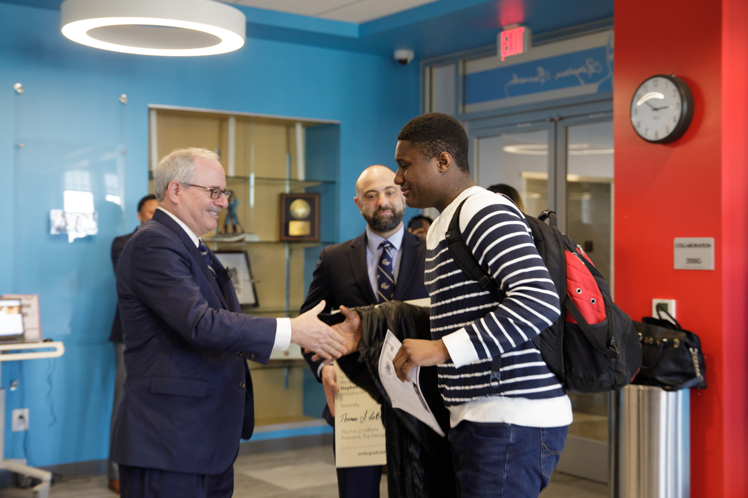 Dr LeBlanc shakes hand of SJT recipient