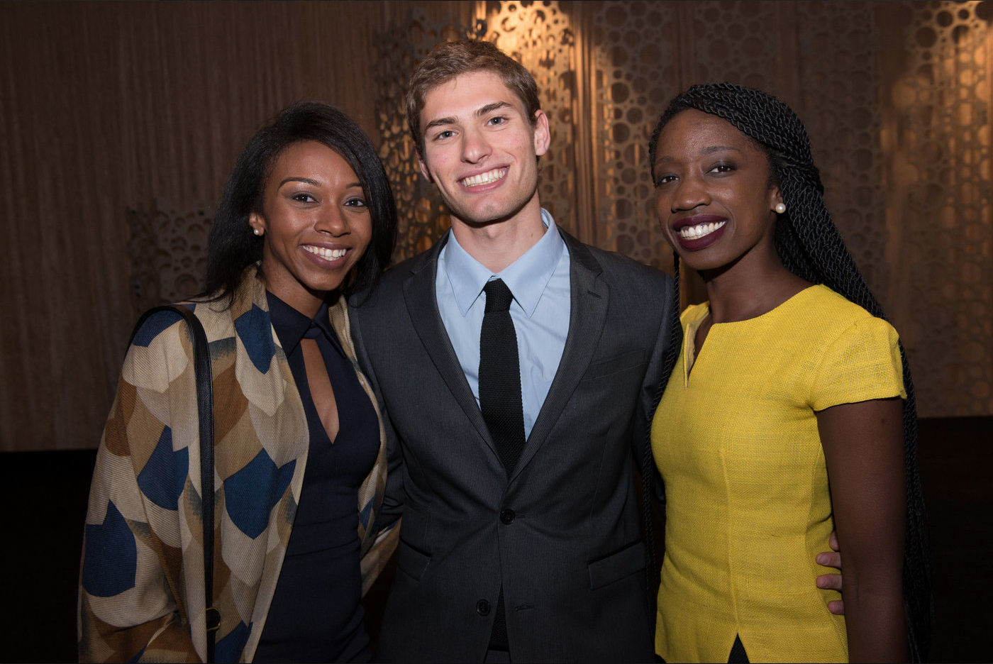 Current students Demetria Clark and Moshe Pasternak and alumna Sally Nuamah, B.A. '11, spoke at the Power & Promise Dinner.