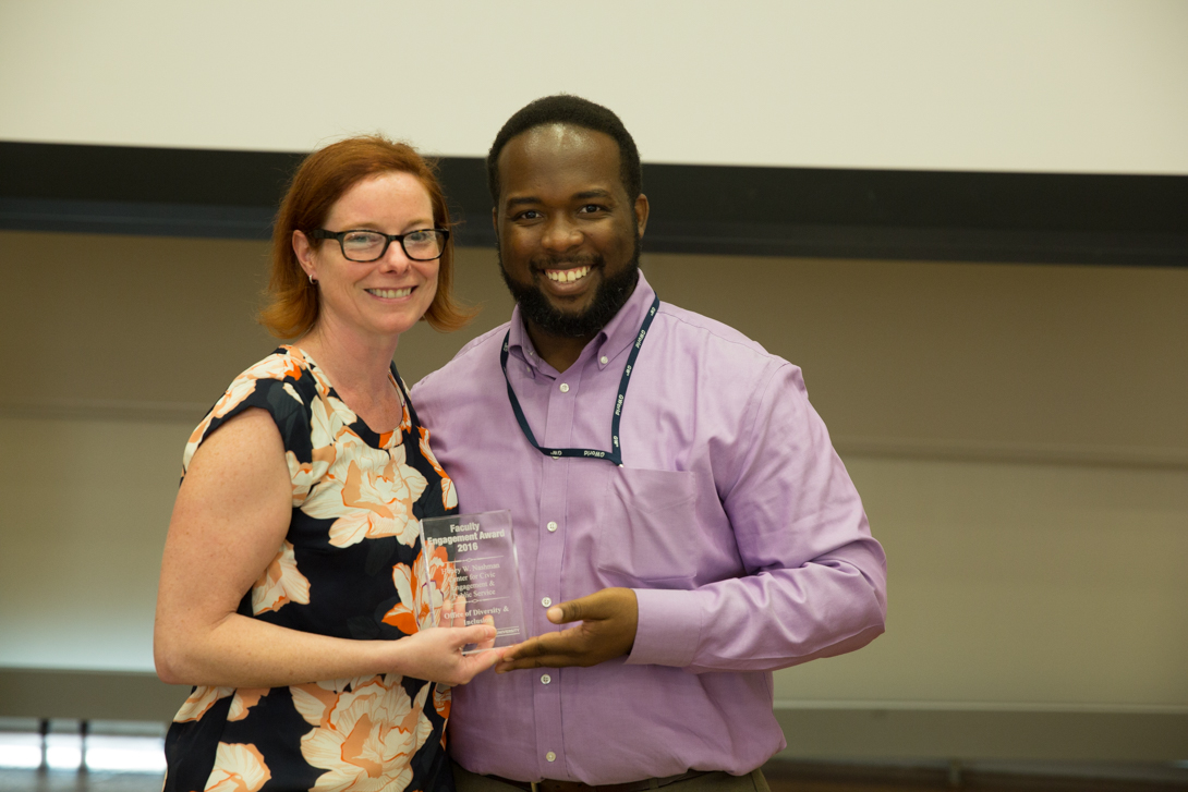 Maurice Smith, coordinator of academic service learning, with Engaged Faculty Award winner Tara Scully. (William Atkins/GW Today
