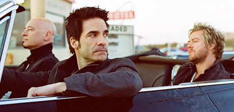 train band members in classic convertible 