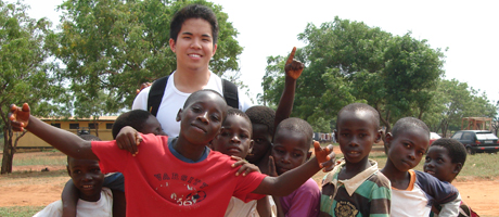 Andrew Pangilinan in Ghana with children during community service mission for Unite for Sight