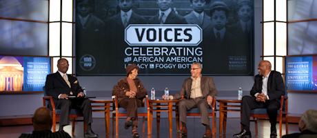 Colbert King, Mary Brown, W. David Riley and James Briscoe talk in panel discussion on stage