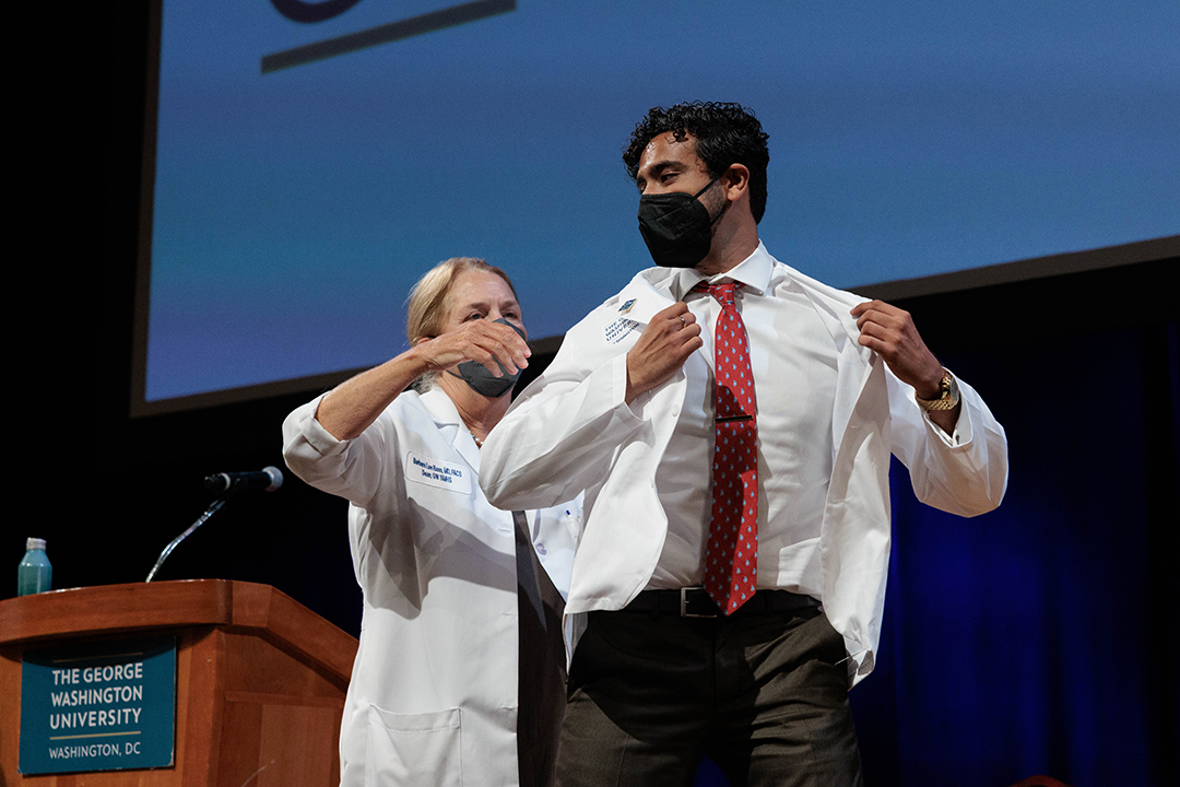 Student Receiving white coat