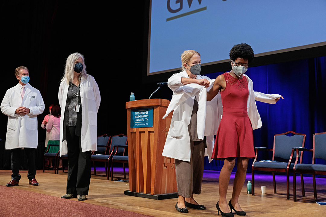 Student receives white coat