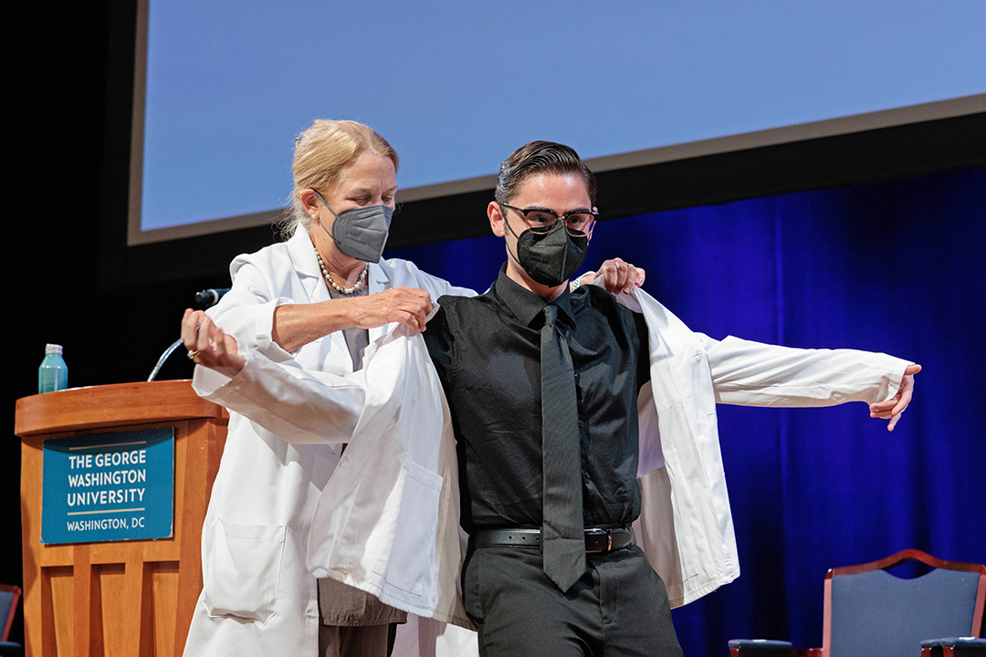 Student receives white coat