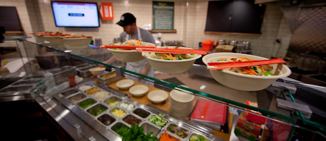 interior of food bar at Whole Foods with vegetables