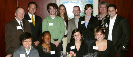 students at event at Mortons standing as a group