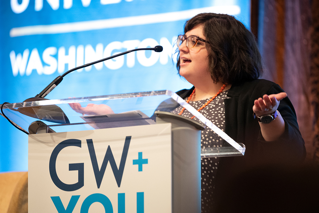  Christine “Chrissy” Caggiano, B.A. ‘06 opens the program at GW + You Philadelphia.