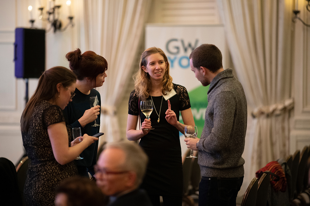 Alumni and guests mingle during cocktail hour at GW + You.