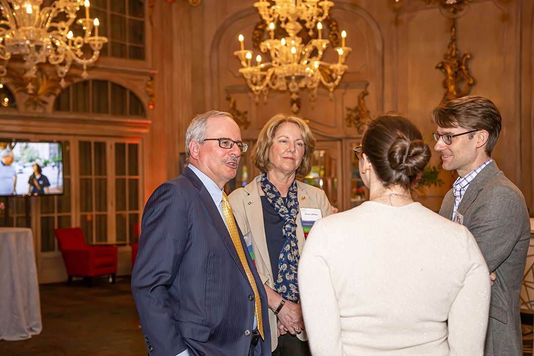 President LeBlanc, Mrs. LeBlanc, GW community members in London