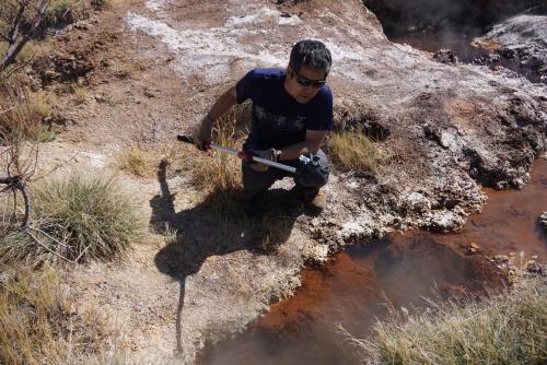 Biology Prof Jimmy aw studies microbes in extreme environments, like this hot spring in Utah.