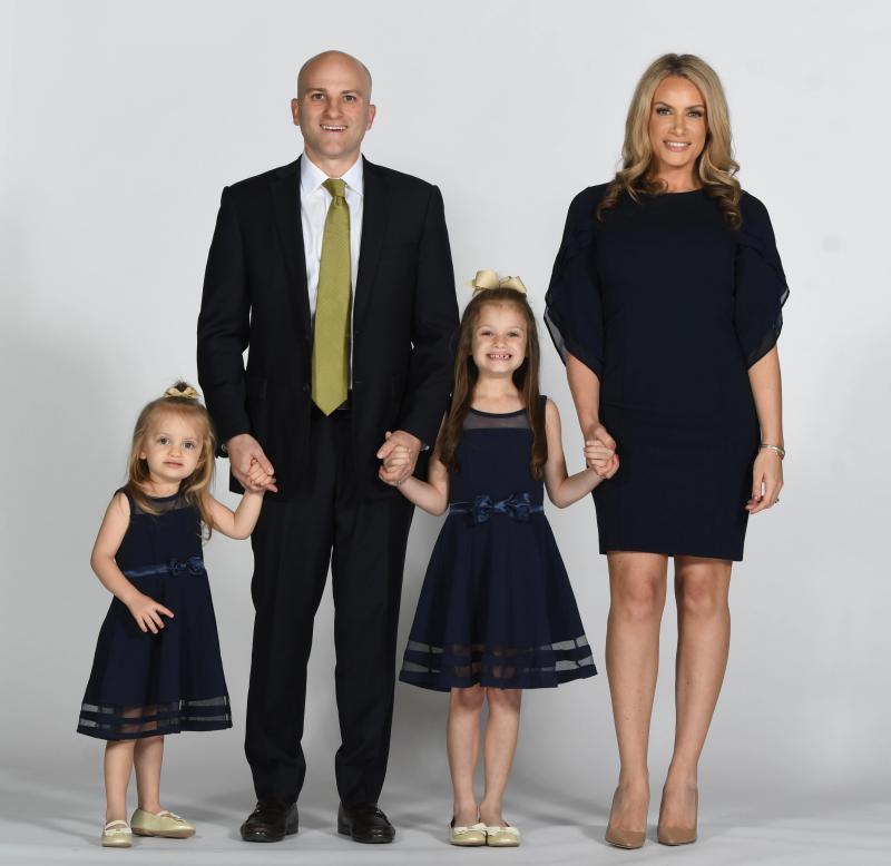 Julie and Chris Caputo with their two children