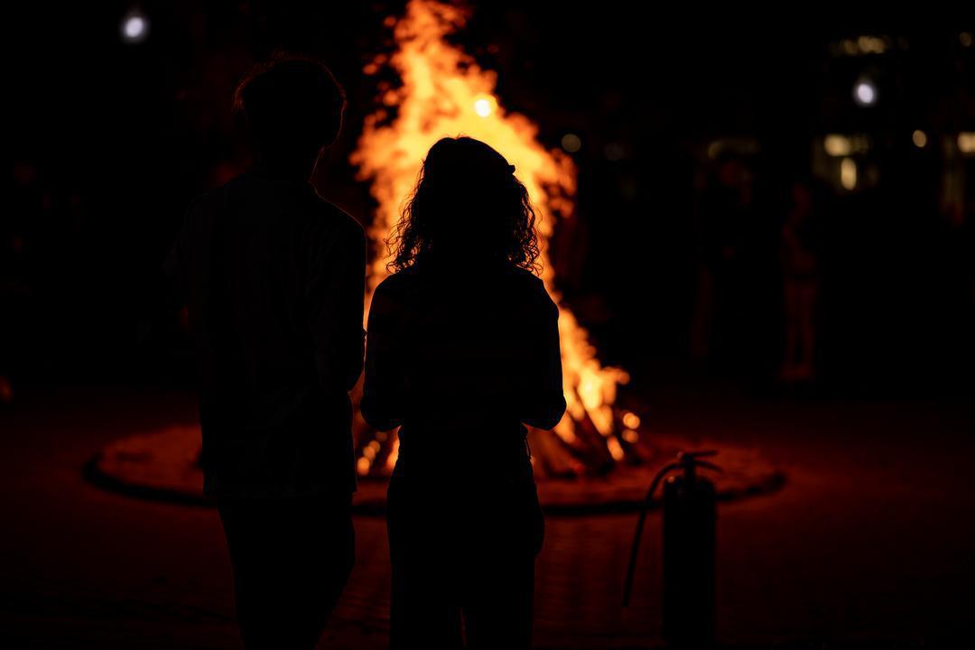 Couple at bonfire