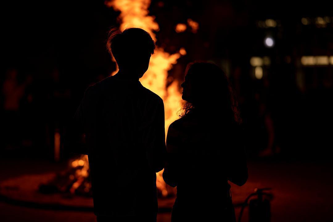Couple at bonfire