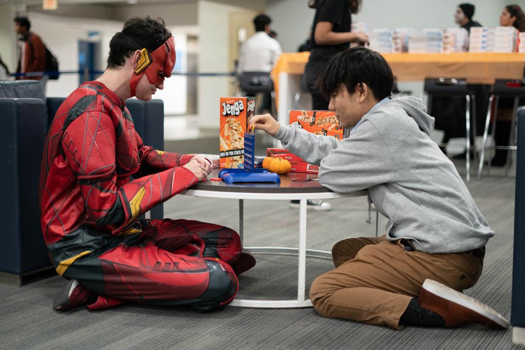 Students playing connect 4