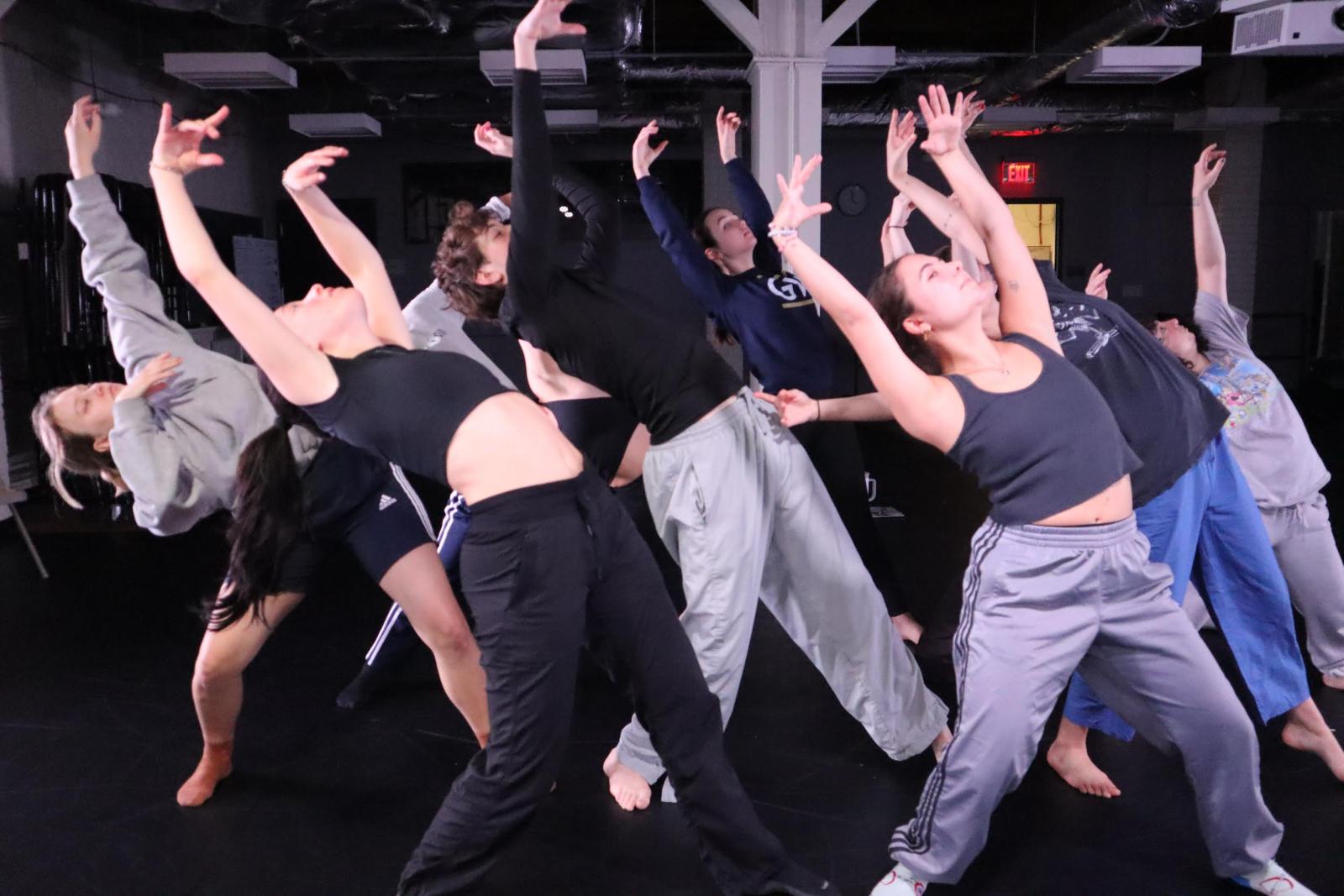 Alexia Papatsa and dancers in motion