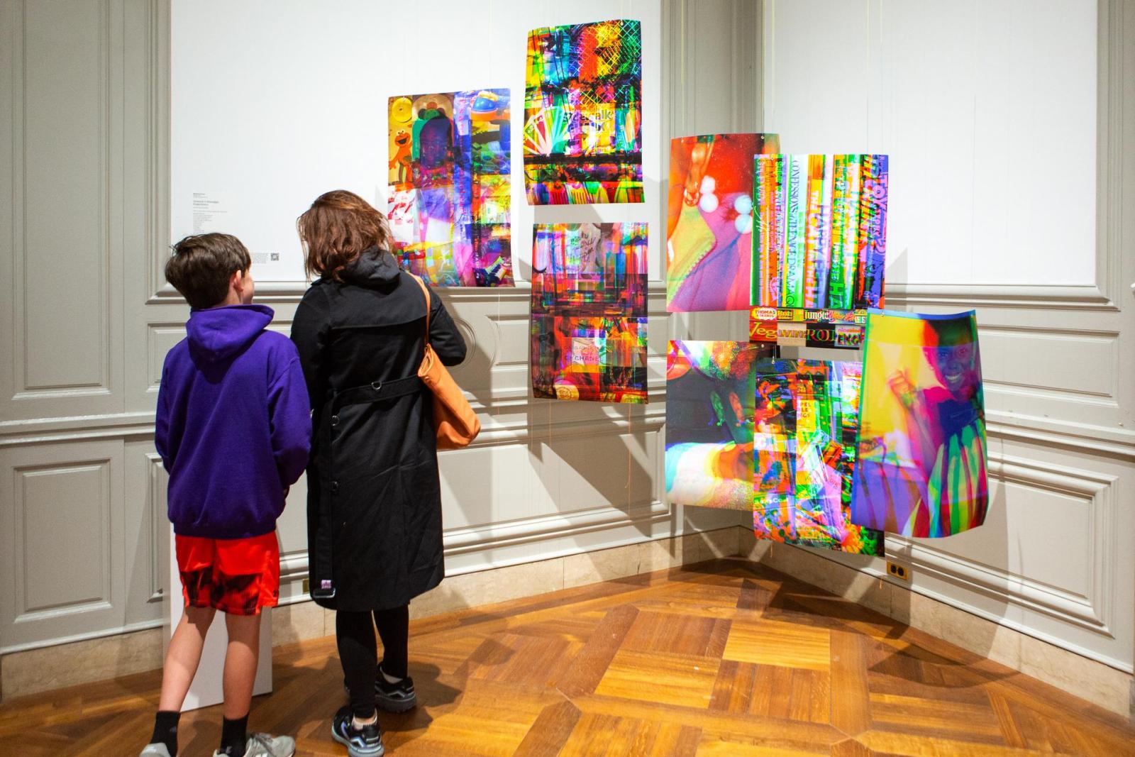 Guests view work on exhibit at Extravaganza