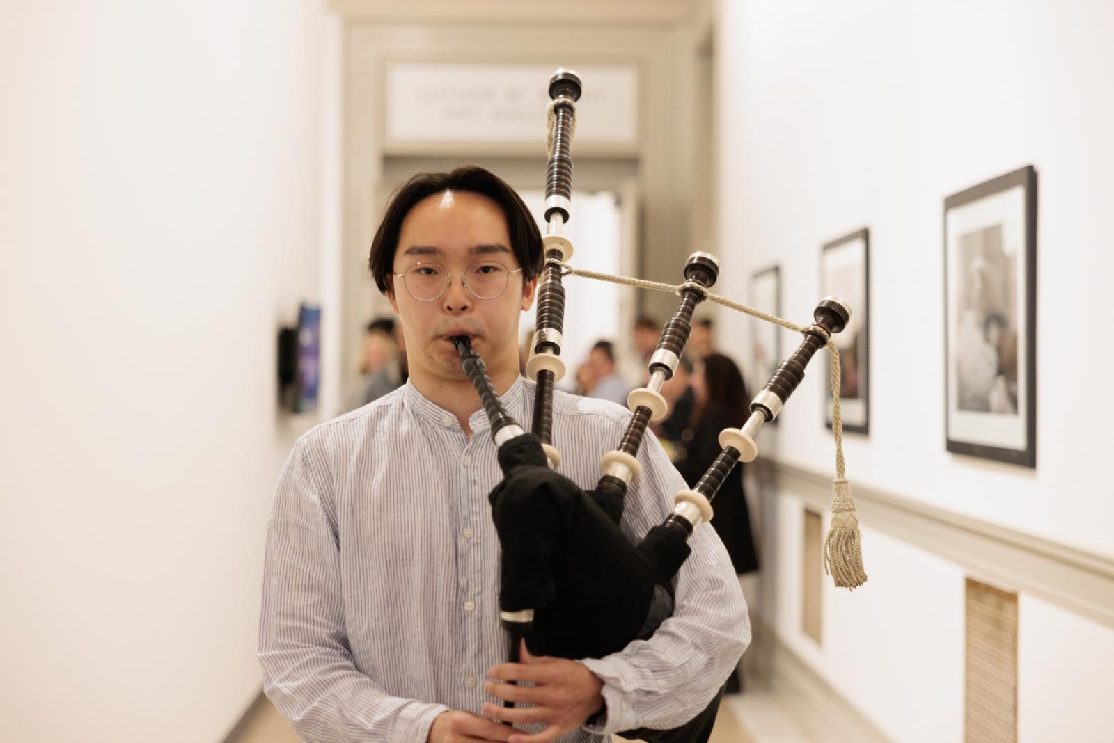 Senior student Kevin Darmadi strolled the halls playing bagpipes