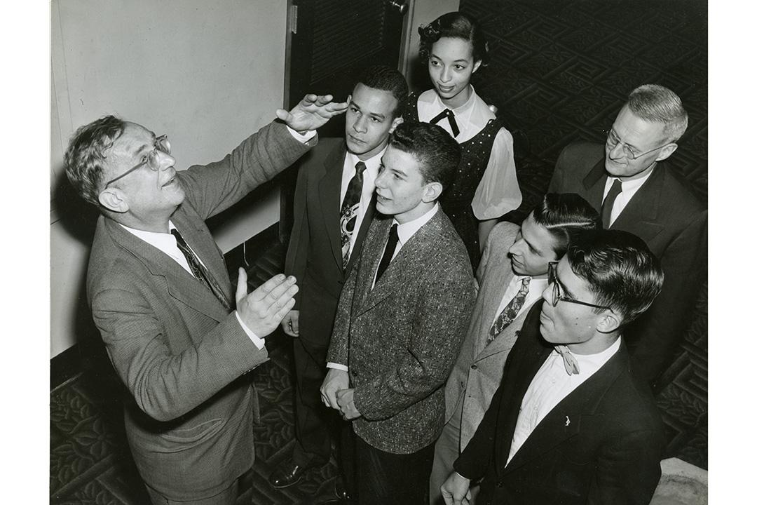 Physicist George Gamow (left with GW students) at Corcoran Hall.