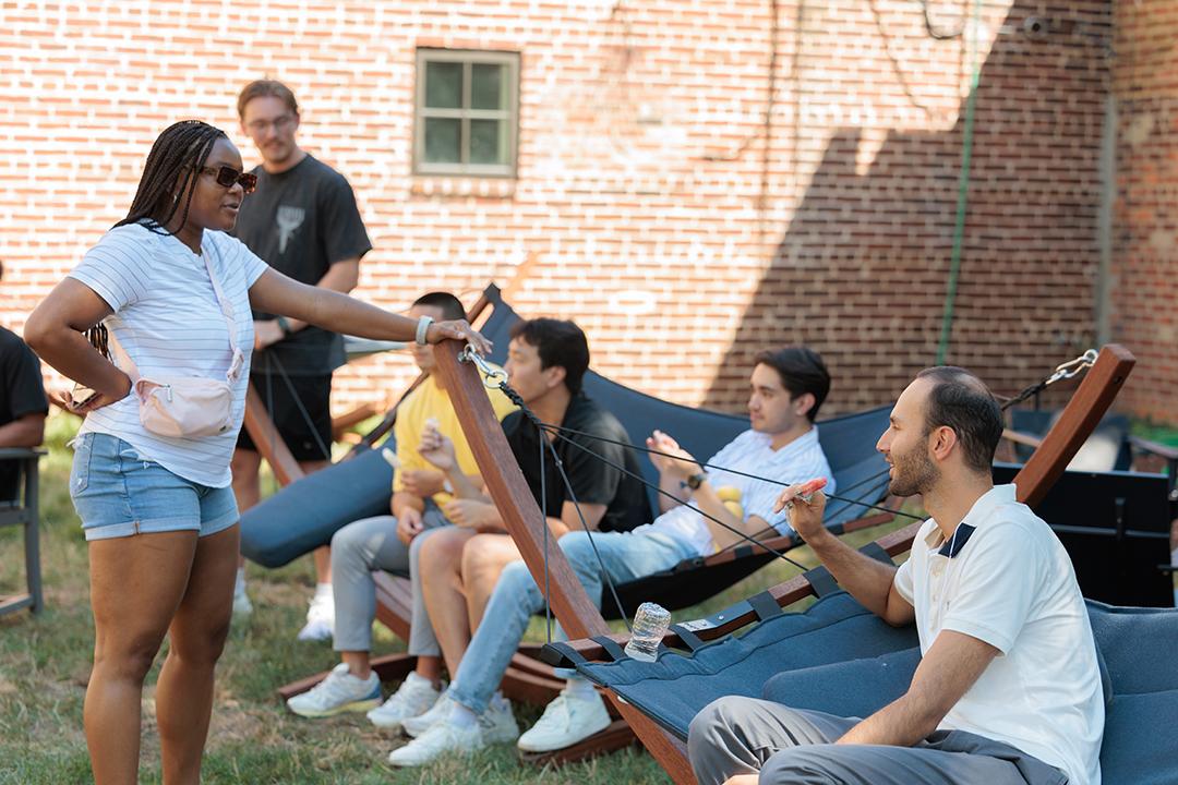 Students at physical therapy orientation enjoy the new hammocks