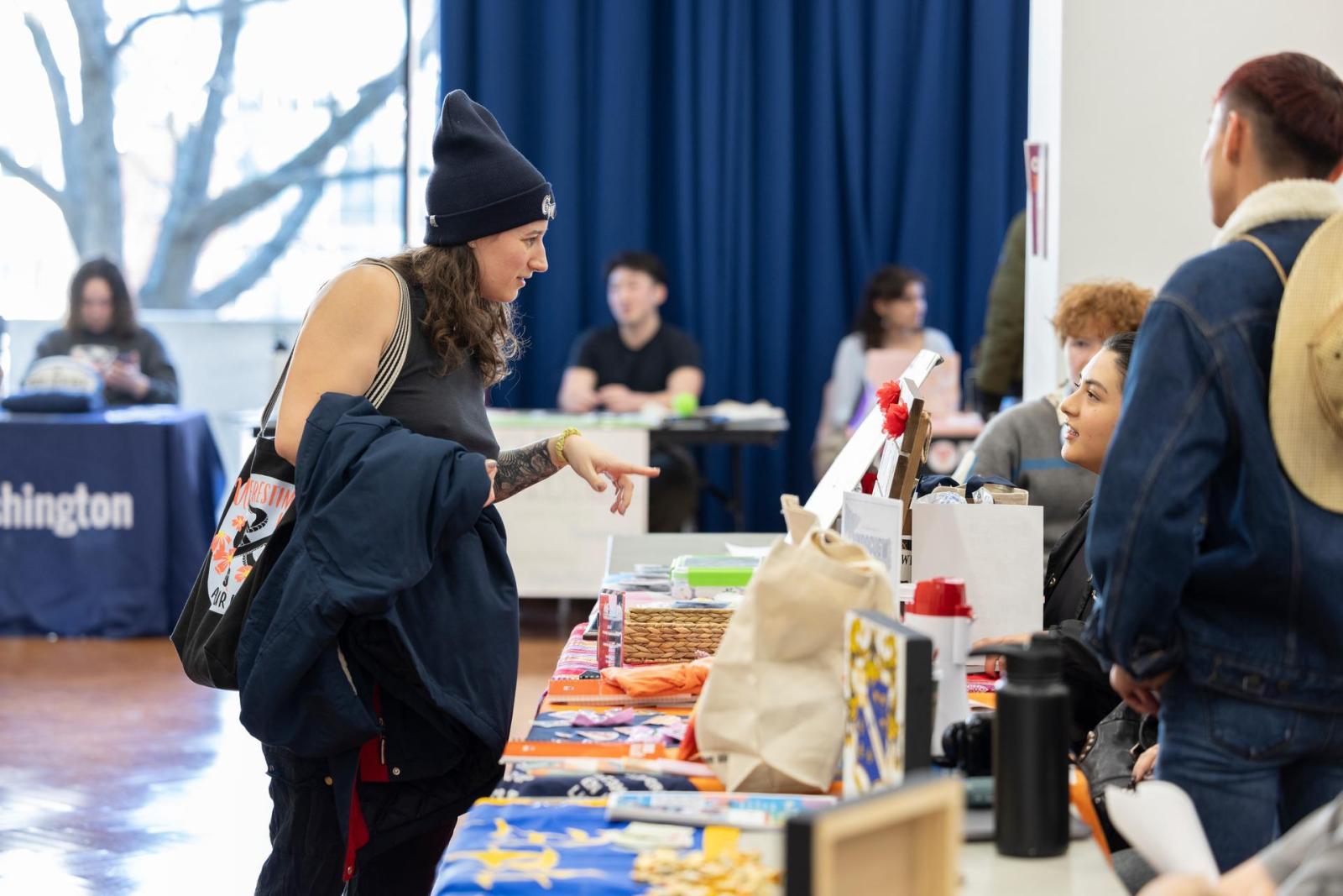 Students chat at the 2025 Student Org Fair