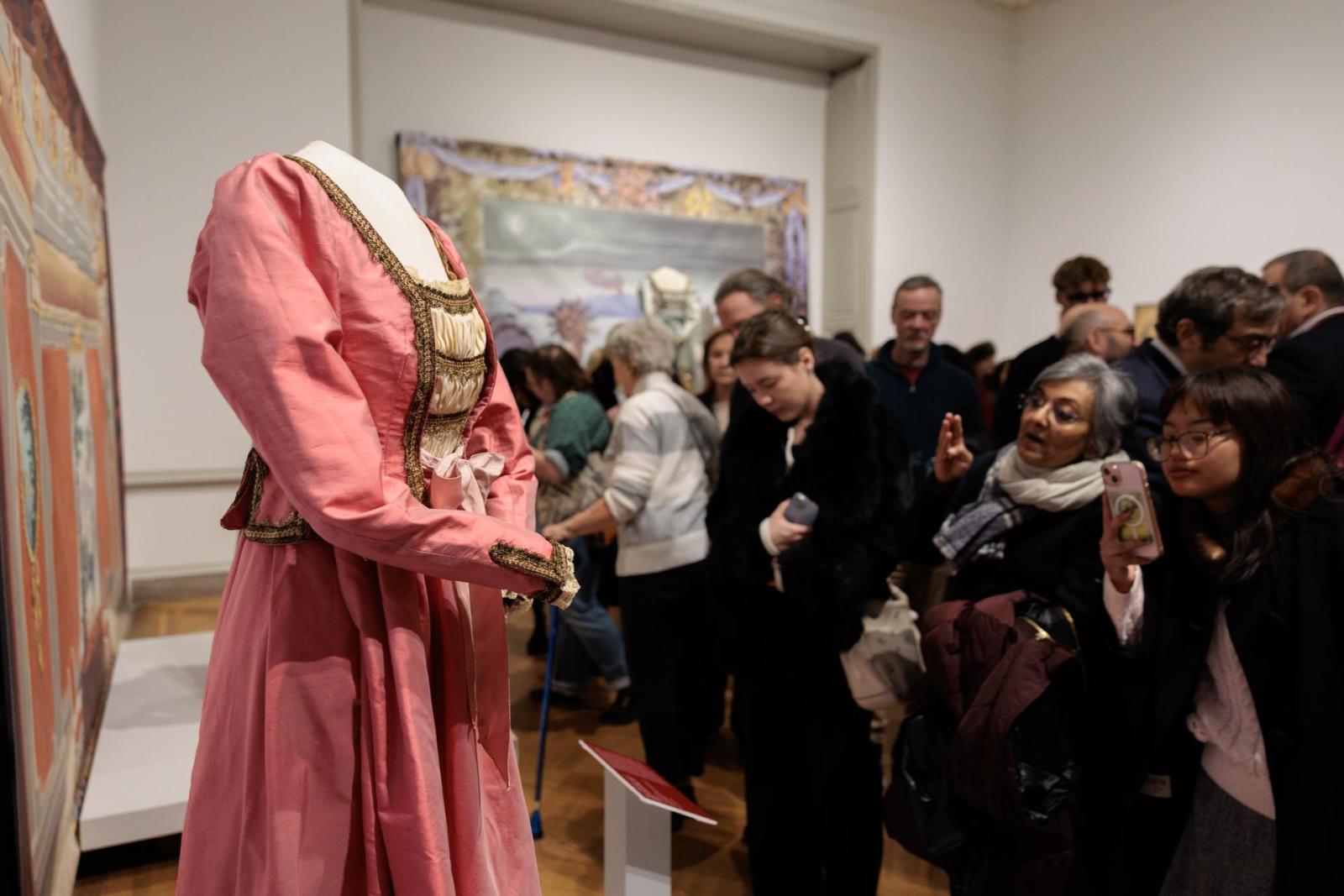 Visitors to the Brady Art Gallery enjoy the exhibit