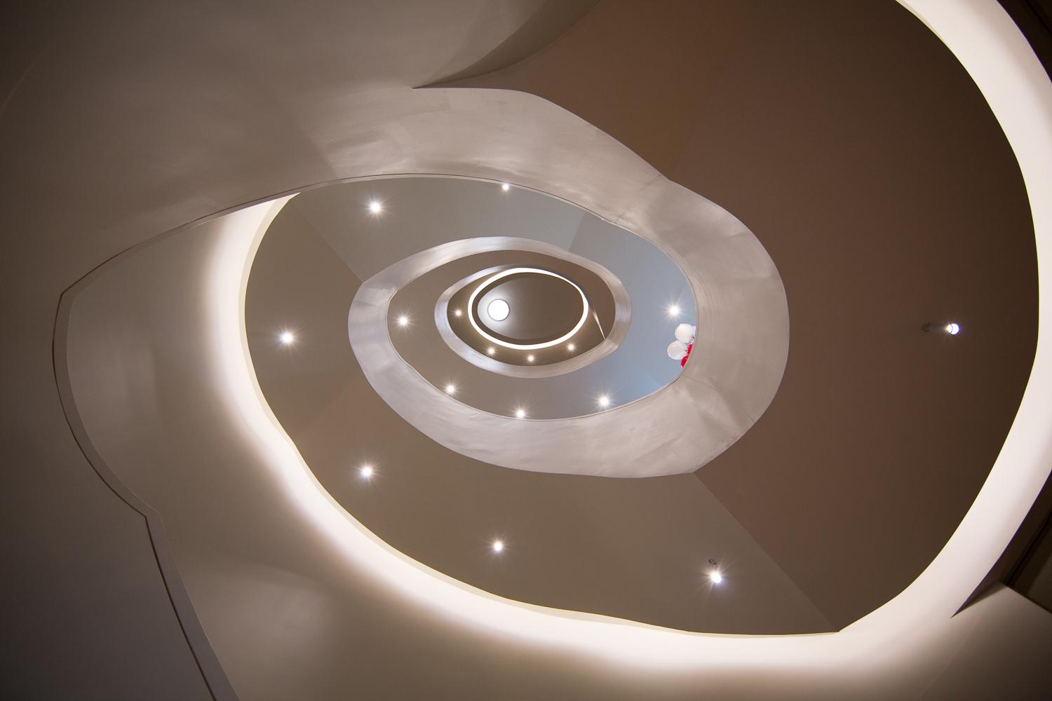 A stunning elliptical staircase extends down the museum's floors.