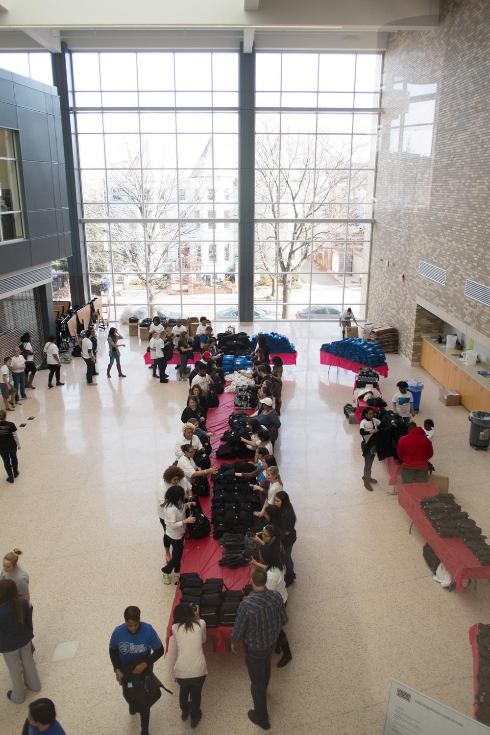 Volunteers at Dunbar packed 500 care kits for wounded veterans in less than two hours.