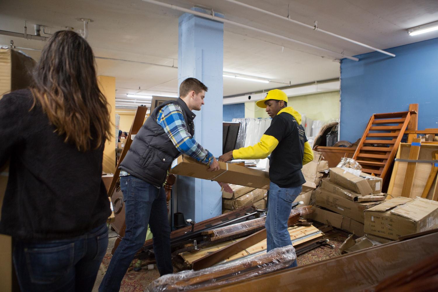 GW students helped organize and move furniture at A Wider Circle in Silver Spring, Maryland. 