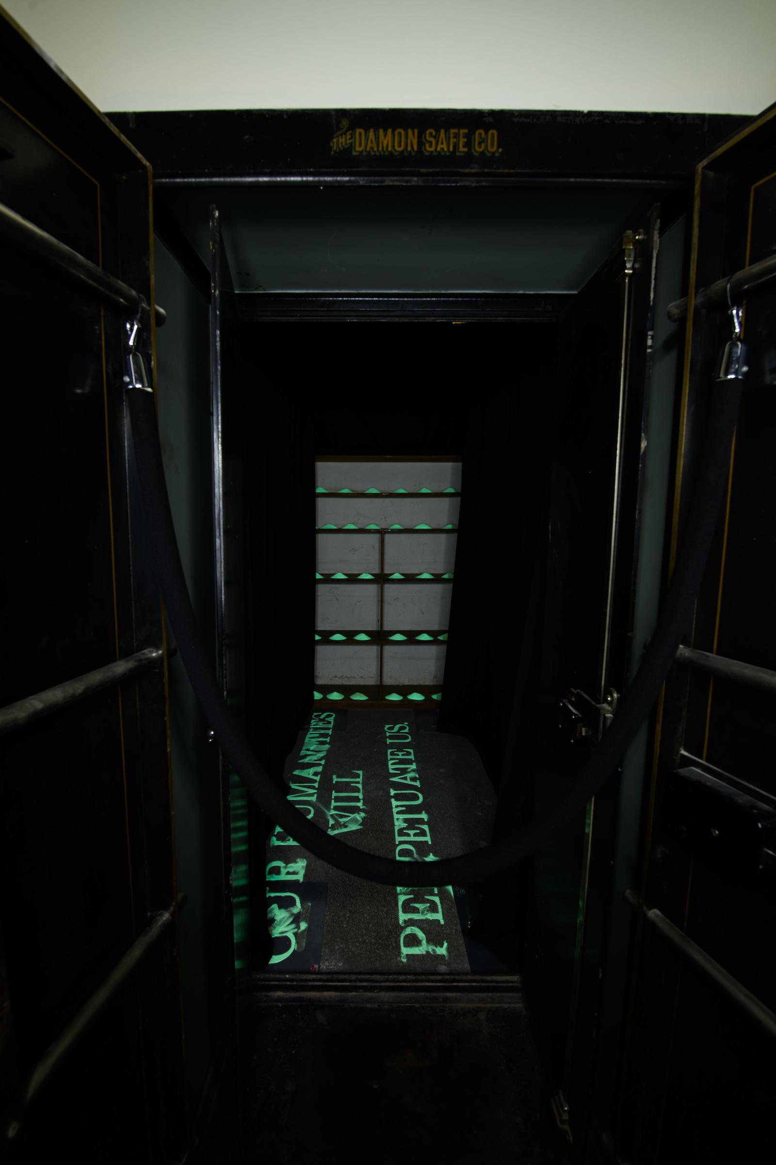 Juan Ernesto Requena, OUR HUMANITIES WILL PERPETUATE US, Phosphorescent pigment, stencils, site-specific dimensions, 2019.