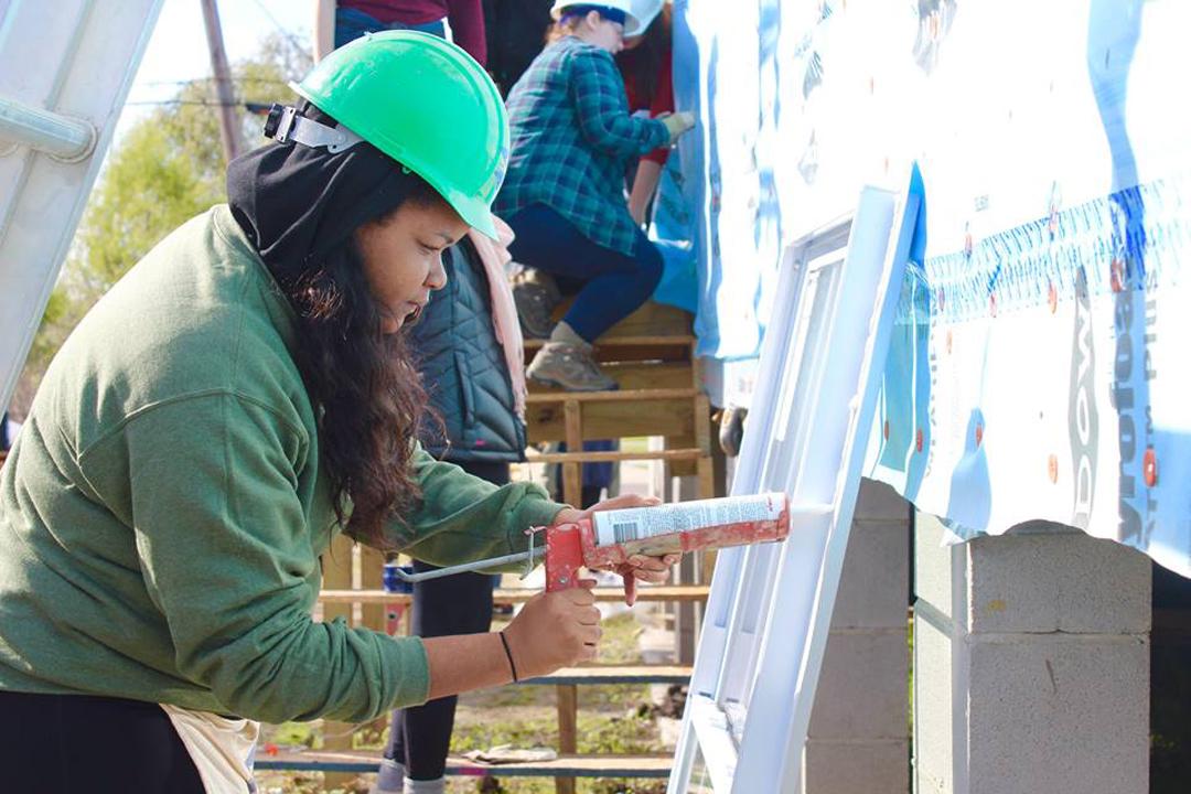 Student Gabriela Whonder works on a construction project
