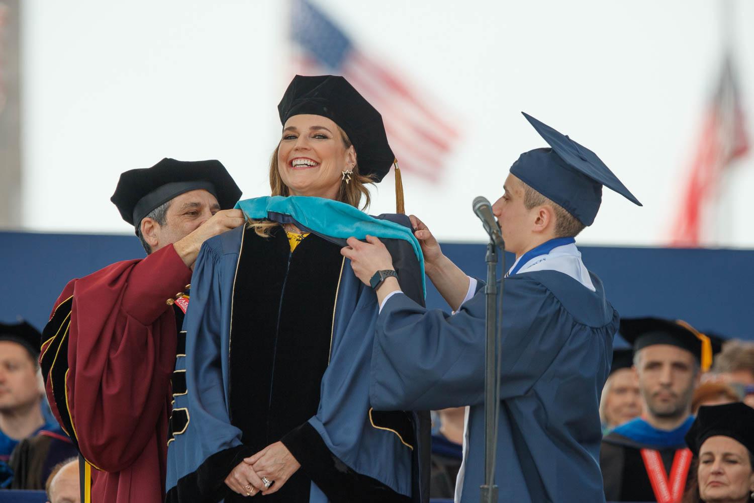 hood being placed on Savannah Guthrie