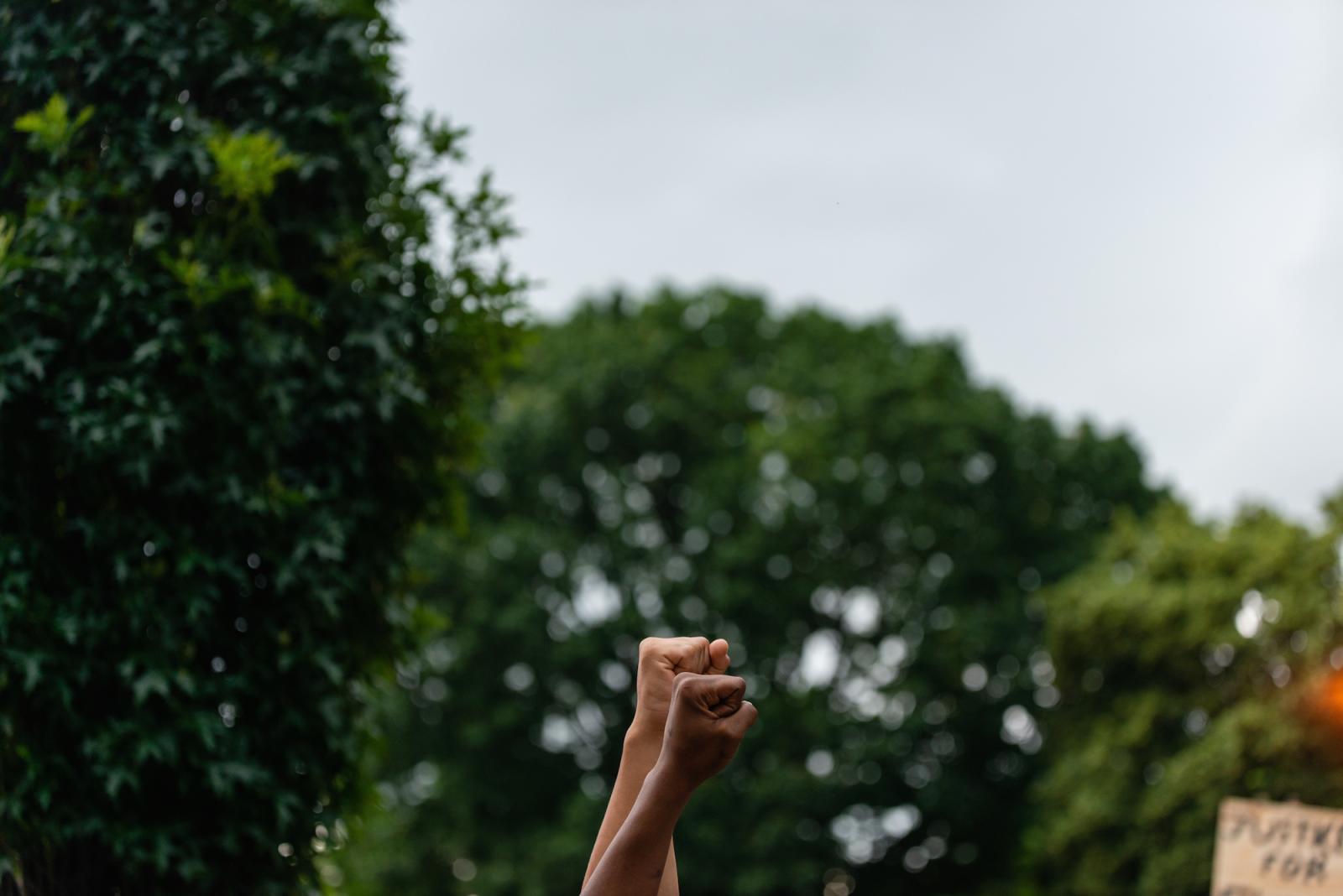 Image of raised fists