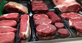 Cuts of meat in a market display 
