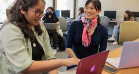 Professor Joubin works with a student.