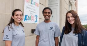 GW students Liseth Widman, Joshua Abraham and Sarah Mann in front of Eliot-Hine Middle School on Friday, Aug. 4. 