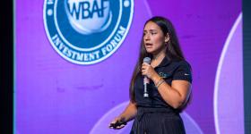 Nathalya Ramirez presents on the WBAF Global Fundraising Stage in Durban, South Africa. (WBAF)
