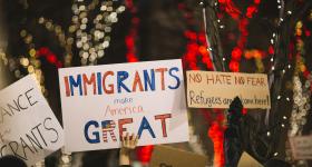 Protestors with pro-immigration signs in Seattle, 2017 (Nitish Meena/Unsplash)