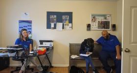 Erin Athey (left) with a community member and team member in one of the C3 Cares clinics. (Courtesy Erin Athey)
