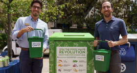 Colin O’Brien, B.A. ‘’20 (l.) and Josh Lasky, B.A. ’07, M.P.A. ’09, of the Office of Sustainability, show off the new composting bin on Kogan Plaza