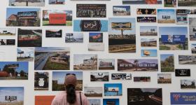 Visitor to Flagg Building views For Freedoms billboards